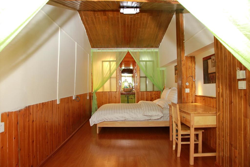 Runtong International Youth Hostel Лицзян Номер фото
