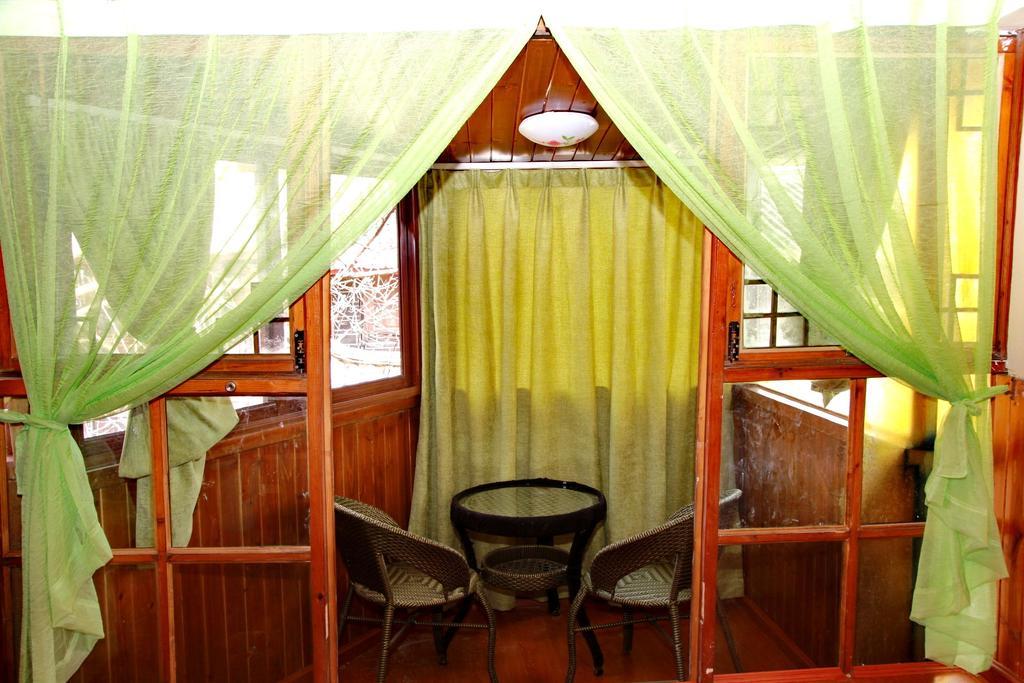 Runtong International Youth Hostel Лицзян Номер фото