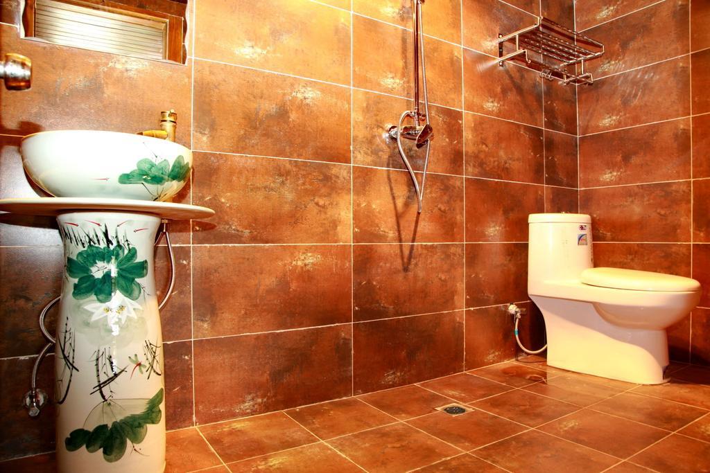 Runtong International Youth Hostel Лицзян Номер фото