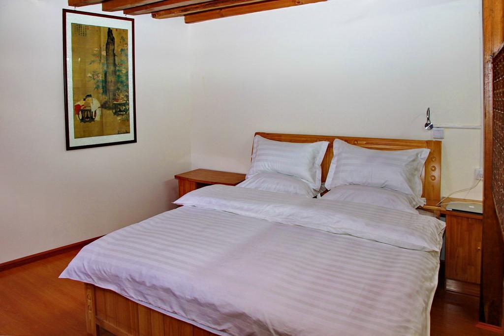 Runtong International Youth Hostel Лицзян Номер фото