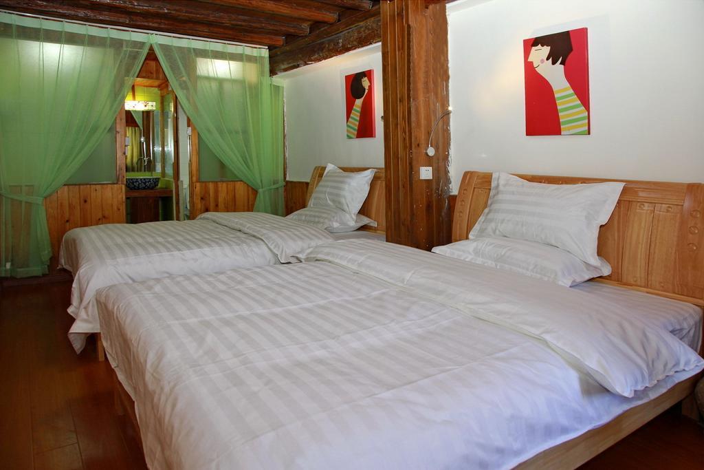 Runtong International Youth Hostel Лицзян Номер фото